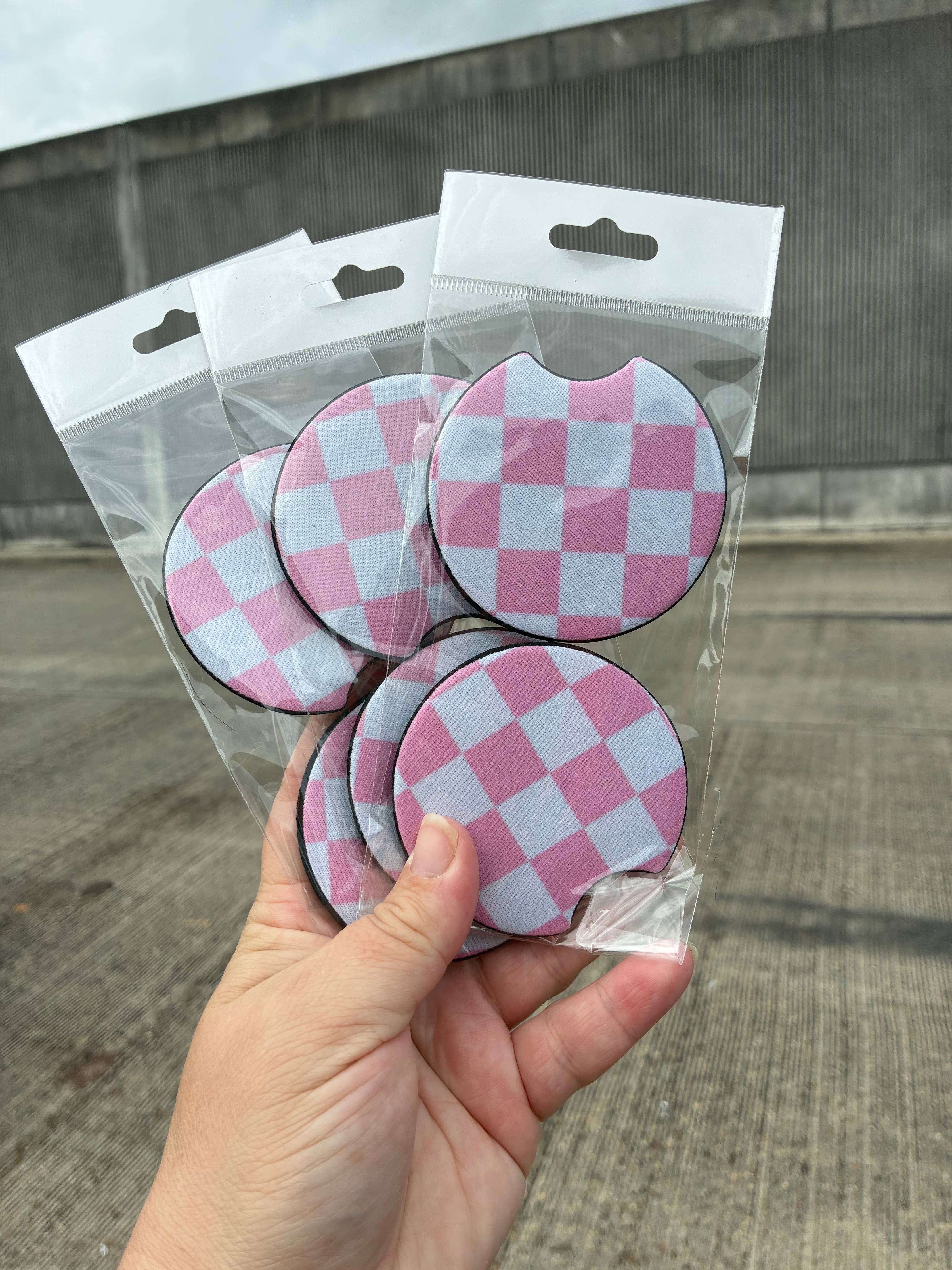 Checkered light pink car coasters
