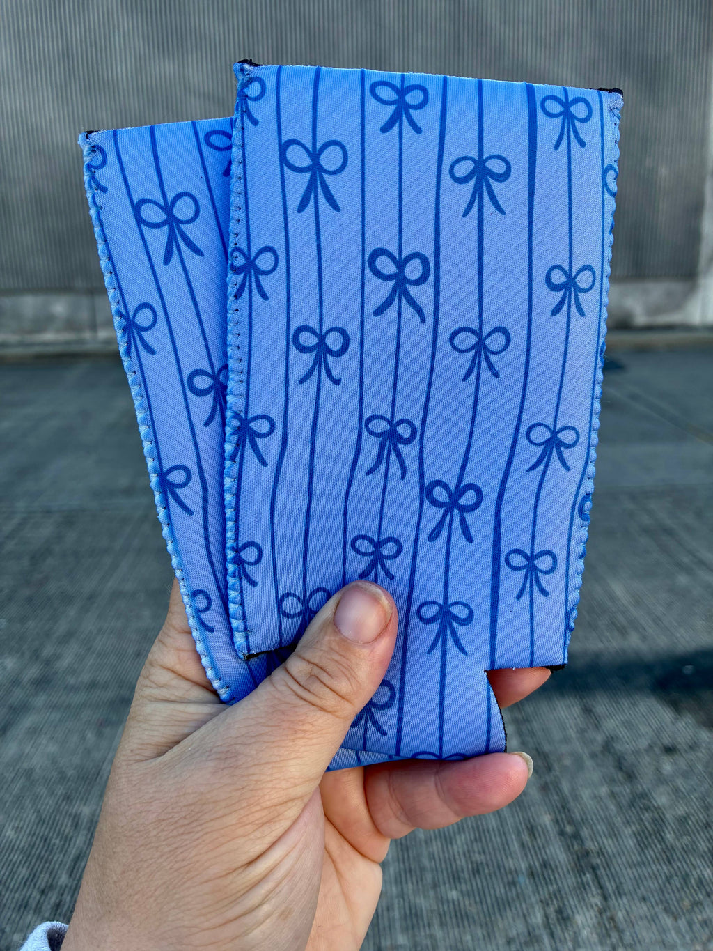 Blue bow can koozies